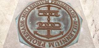 Close-up photograph of a Millennium Promenade plaque