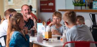 Family enjoying a meal at Stakks Pancake House