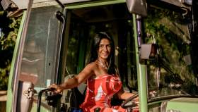 America of Oastbrook Vineyard sat in her tractor smiling