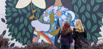 012 Women Looking at What Blooms is Us Mural Along North Avenue in Wauwatosa