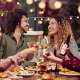 friends laughing wine cheers