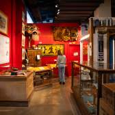 A person going through the Chinese exhibit at the Nanaimo Museum.
