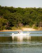 Two men on a fishing boat on Lake Texoma
