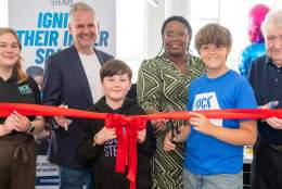 L-R Elise Fry, Scott Monks, Merlin, Sharon Thompson, Archie, Jim Simpson at the ribbon cutting launch event of Rocksteady in the Jewellery Quarter.