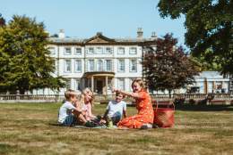 An image of a family enjoying a picnic out Sewerby Hall and Gardens.
