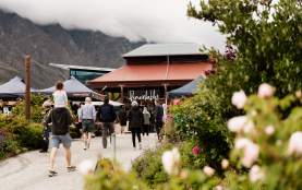 People walking into the Remarkables Market