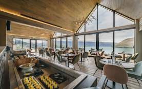 Event or conference set up in a hotel with view of lake and mountains out the windows