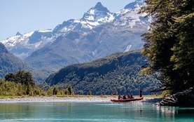 Group on Funyak tour with snow-capped mountains in the background