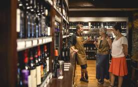 People tasting wine