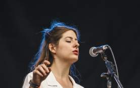 Molly Burch sings on stage at ACL Fest