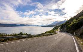 Iconic Queenstown Glenorchy Road with lake and mountain views
