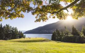 Golfers at Queenstown Golf course in spring