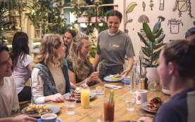 Group of friends enjoying breakfast at Yonder Café.