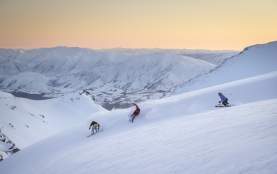 Group Skiing at The Remarkables Ski Field at sunrise