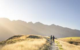 Couple Biking Along Jack's Point Trail