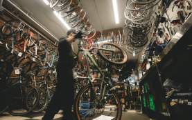 A bike being moved to be repaired