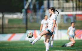 woman playing soccer