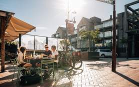 People enjoying a beer at after biking World Bar