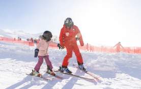 Cardrona Ski Instructor with a child during a lesson