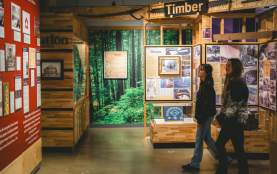 Two people walking through the Nanaimo Museum