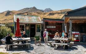 A group of people enjoying a beautiful day in Glenorchy at Mrs Wooly's General Store