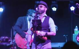 Grupo Fantasma band on stage in austin texas