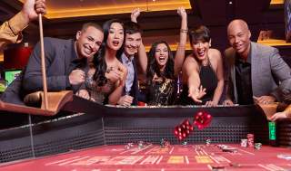 People playing craps in a casino