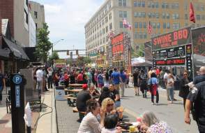 People walking downtown during the Rib White, & Blue Festival