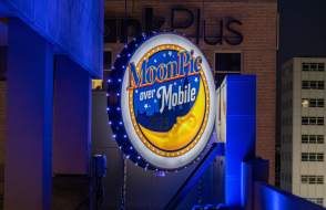MoonPie Over Mobile electric MoonPie sits on the side of a building