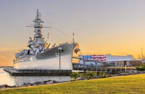 A docked battleship destroyer during sunset