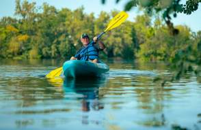 Man kayaking on Huron River