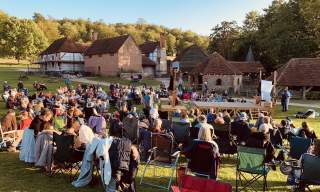 People watching open air theatre at Weald & Downland Living Museum