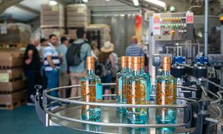 People on a distillery tour at Silent Pool Distillery