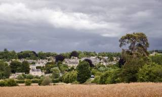 View across a corn field towards Charlbury