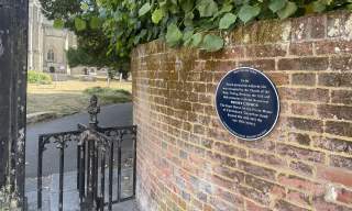 Millennium trail blue plaque at Christchurch Priory