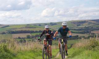 A couple of cyclists from Marmalade MTB on the South Downs Way in Sussex