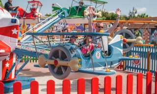 Family on a fairground ride