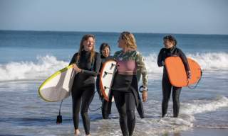 a group of ladies surfing in devon