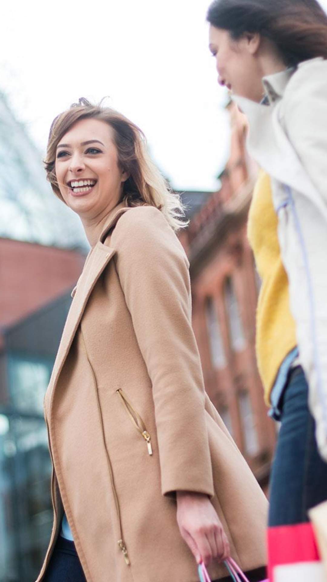 ladies shopping in Belfast, outside Victoria Square Shopping Centre.