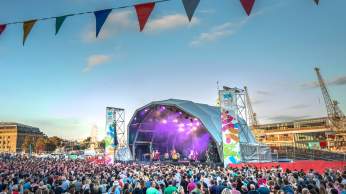 A view of the crowd in front of a stage at Bristol Harbour Festival - credit Paul Box