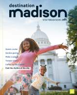 Cover of the 2022 Destination Madison Visitors Guide featuring two young Black girls smiling and dancing in front of the Wisconsin State Capitol building