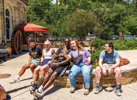 Bobby Portis taking a group photo with people at Colectivo