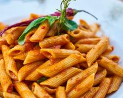 A plate of pasta with marinara in Knoxville