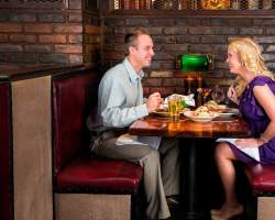 Couple eating dinner together