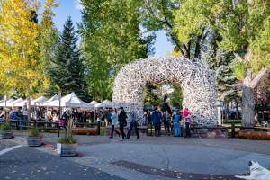 Fall Arts Festival seen from the Antler Arch in Jackson Hole Town Square on a sunny day.