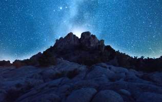 Starry blue skies over the rolling rock formations of Three Peaks Recreation Area in Cedar City.