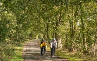 A couple cycling across the Yorkshire Wolds