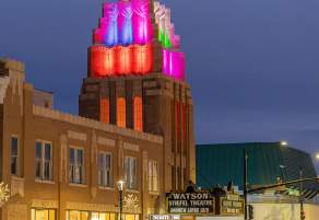 The stiefel theatre tower at night with colorful lights