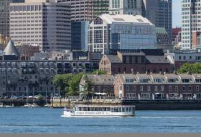 Charles Riverboat cruise in front of Custom House Tower