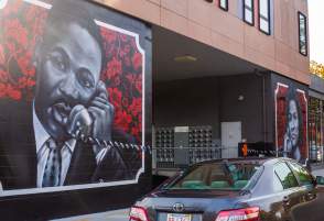 Mural in Roxbury Depicting MLK Speaking on a Phone
